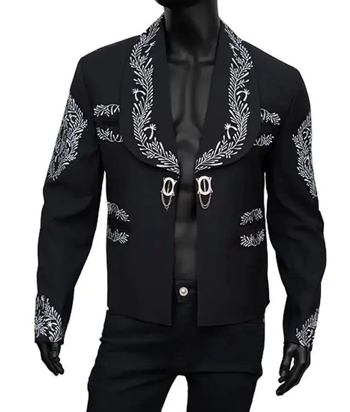Black blazer with white embroidery on a mannequin against a white background