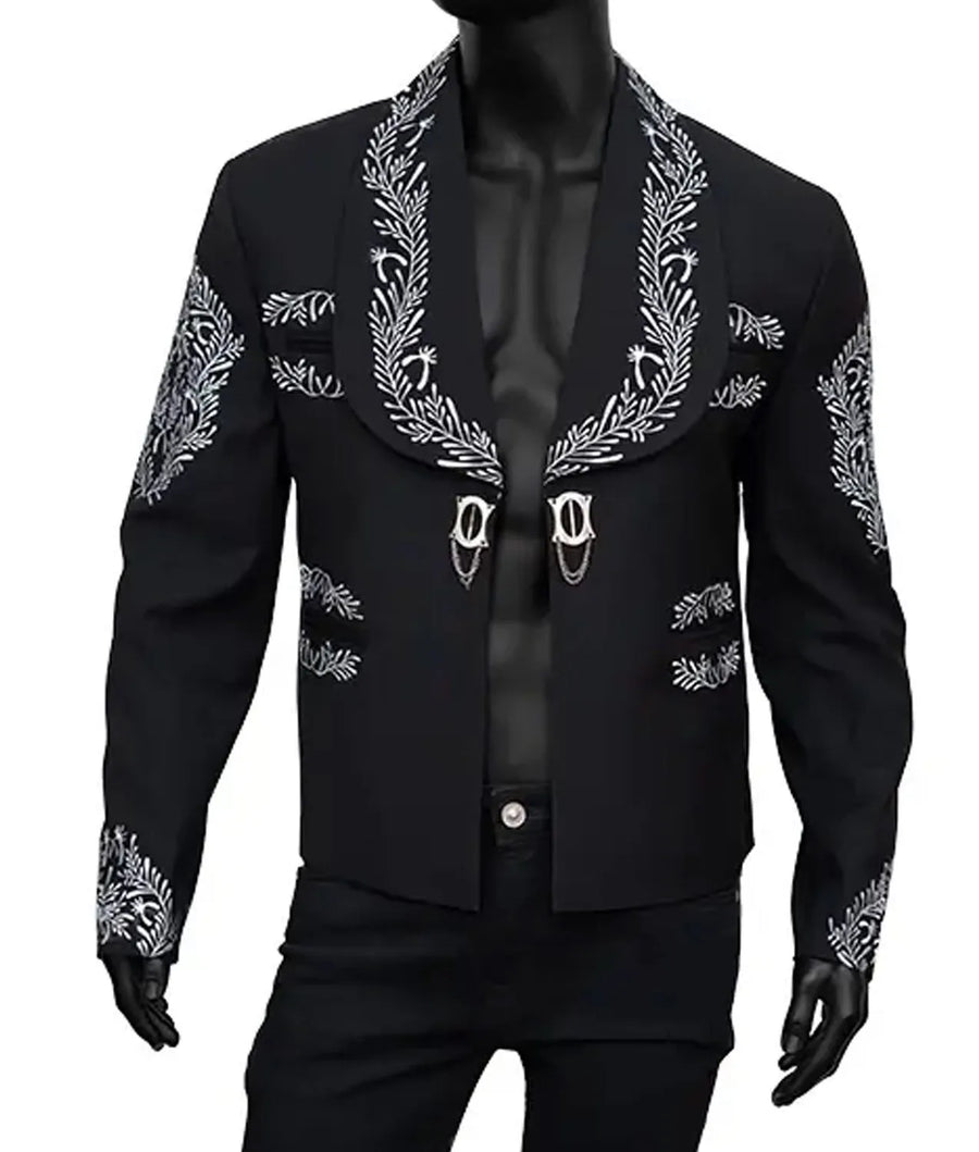 Black blazer with white embroidery on a mannequin against a white background