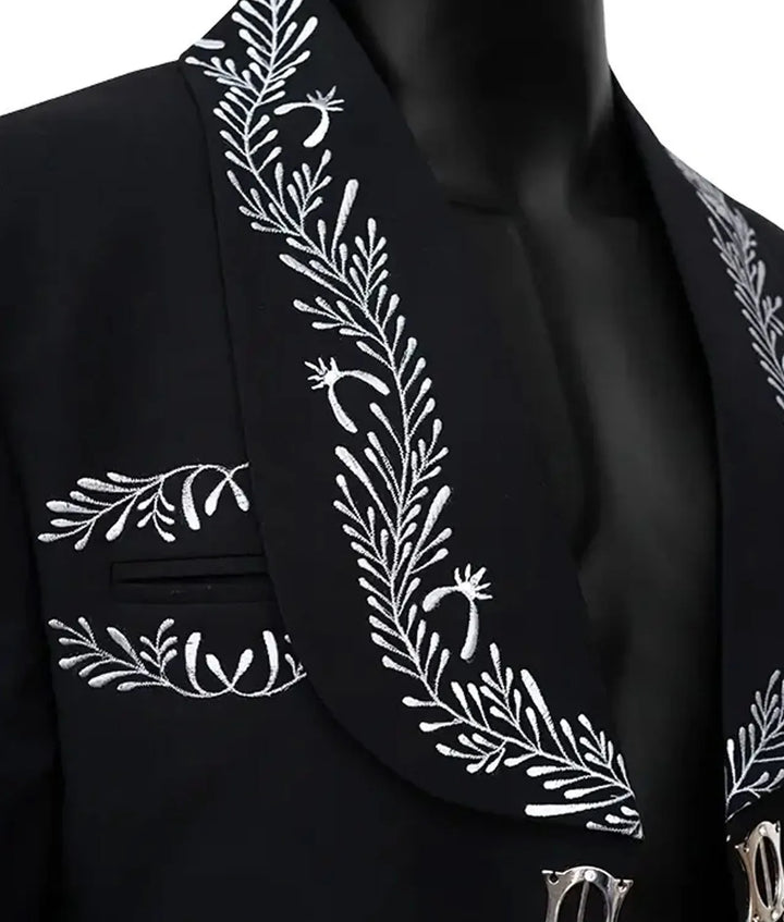 Black blazer with white floral embroidery on a mannequin