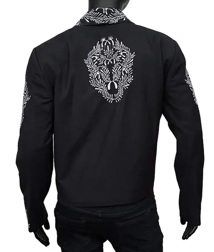 Black jacket with white floral patterns on a white background