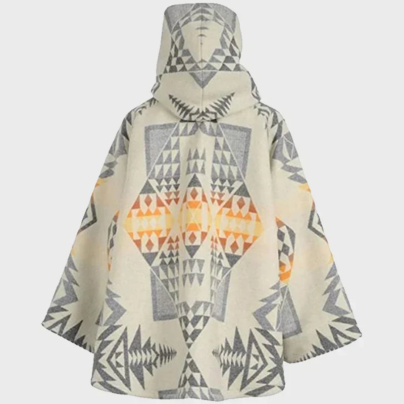 Yellowstone Beth Dutton White Poncho Coat with geometric pattern on a white background