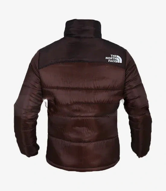 Brown puffer jacket with The North Face logo on a white background