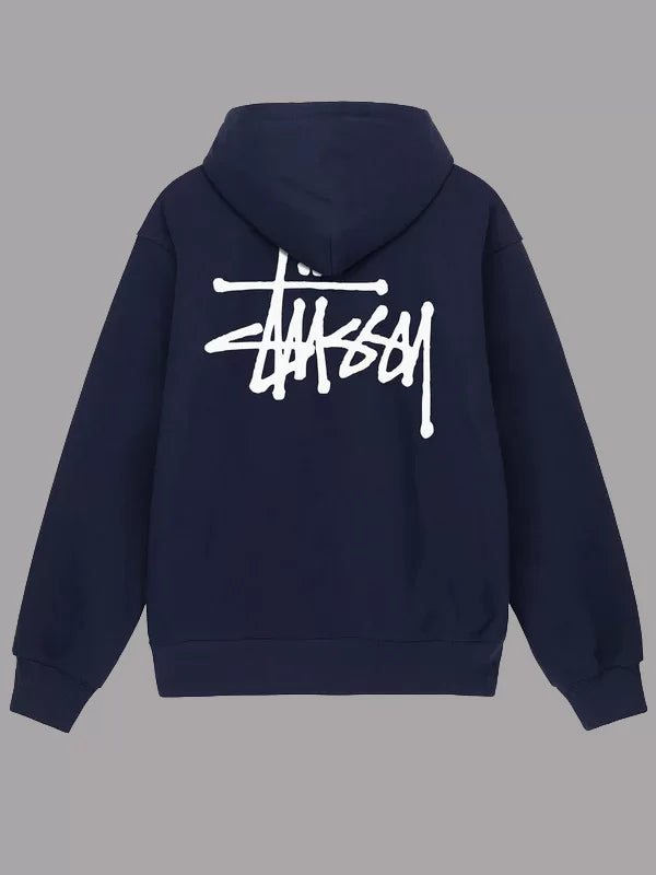 Navy hoodie with white logo on the back against a gray background