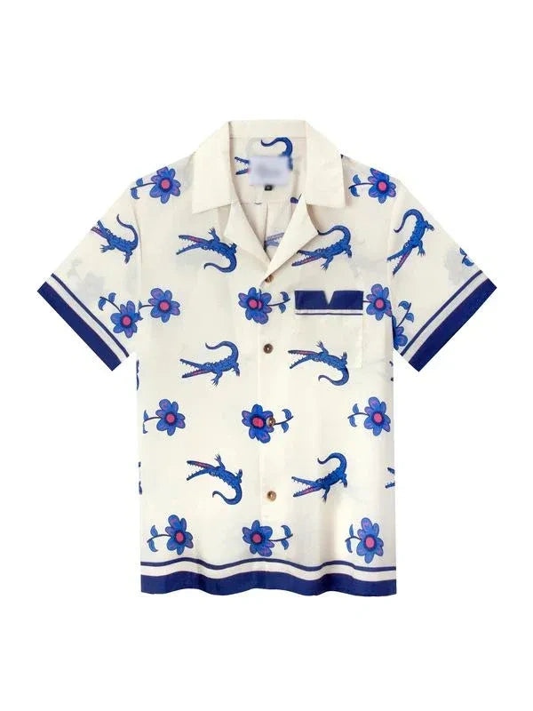 Short-sleeve shirt with blue animal and flower pattern on a white background