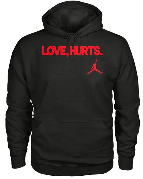 Black hoodie with red text 'LOVE, HURTS.' and a logo on a white background